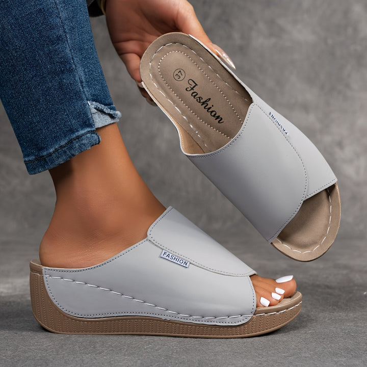 The Zephyrine Wedge Sandal